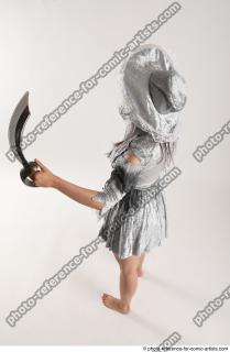 2020 01 LUCI AVIOL STANDING POSE WITH GUN AND SWORD&hellip;